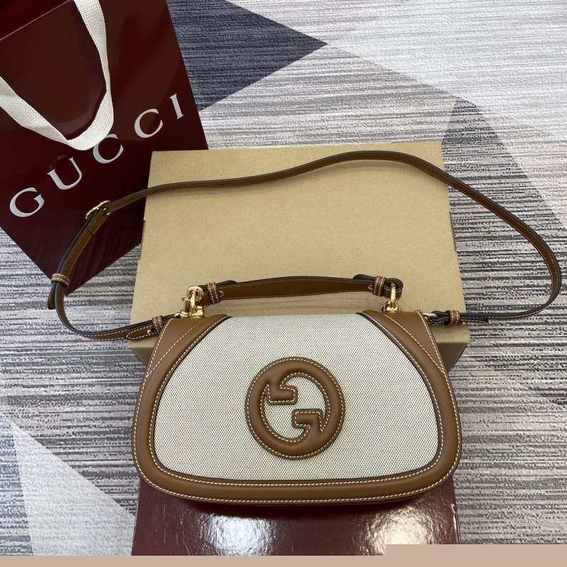 G*u*i satchel bags